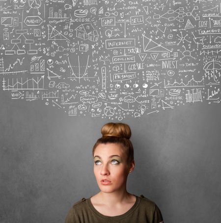 Thoughtful young woman with sketched charts over her head