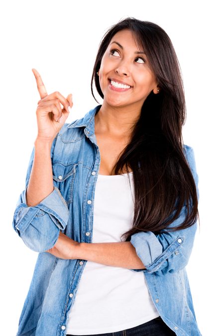 Happy thoughtful woman pointing an idea - isolated over white background 