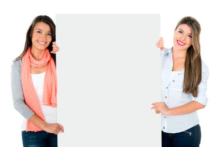 Happy girls holding a banner - isolated over a white background