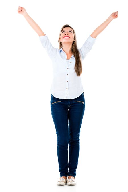 Successful woman with arms up celebrating - isolated over white background 