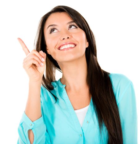 Happy thoughtful woman pointing an idea - isolated over white background 