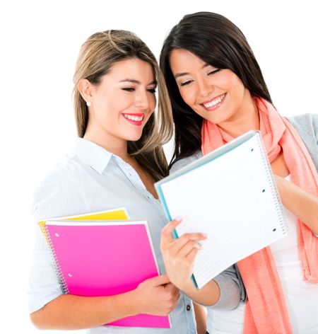 Happy female students - isolated over a white background 