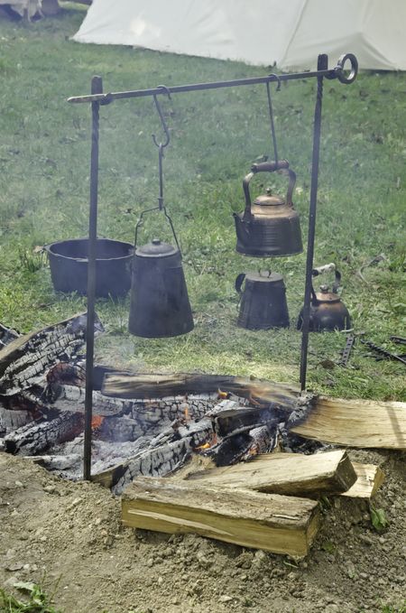 Smoky campfire in military encampment at reenactment of American Revolutionary War (1775-1783)