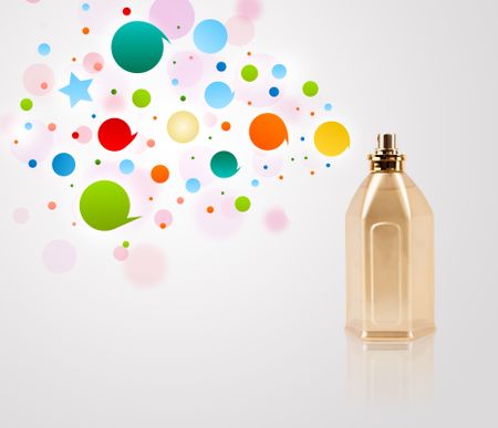 Perfume bottle spraying colorful bubbles