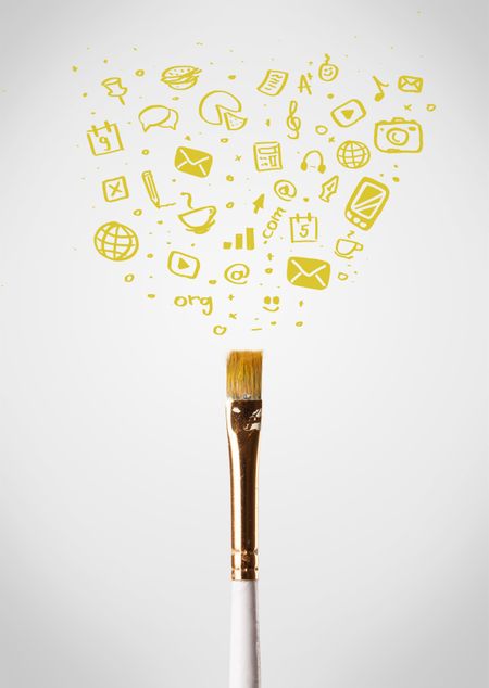 Paintbrush close-up with sketchy social media icons
