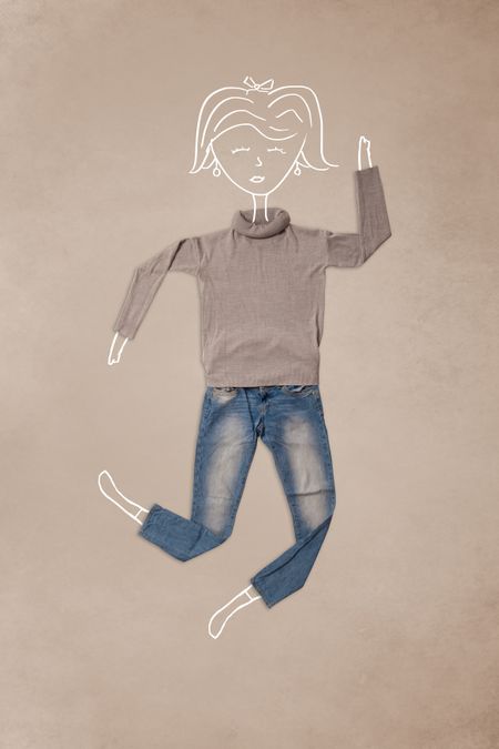 Colorful placed clothes in different actions with woman drawing