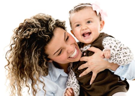 Happy mother and daughter smiling - isolated over a white background