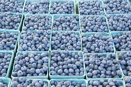 Cartons of blueberries at farmer's market