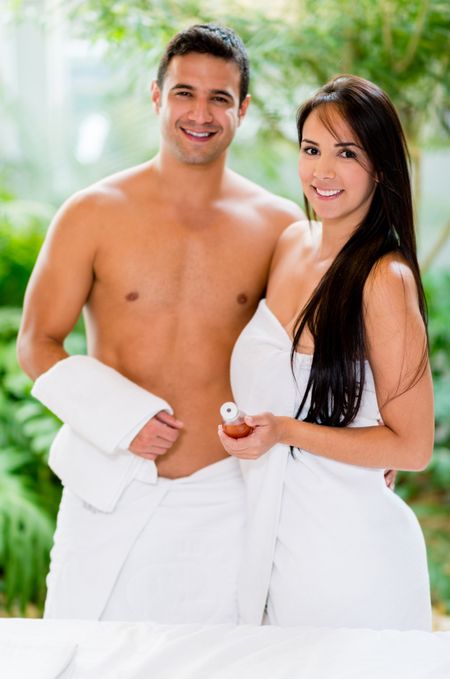 Beautiful couple in a romantic date at the spa