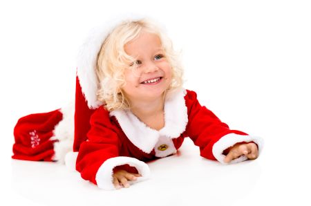 Portrait of a very happy female Santa smiling - isolated over white 