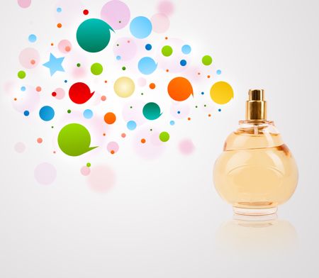 Perfume bottle spraying colorful bubbles