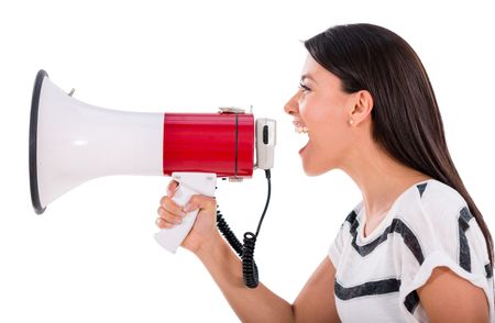 Angry woman yelling through a loudspeaker - isolated over white background