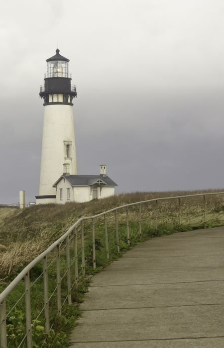 Yaquina Head Lighthouse, a popular tourist attraction built in 1871 in Newport, Oregon, on a stormy morning in September along the Pacific coast