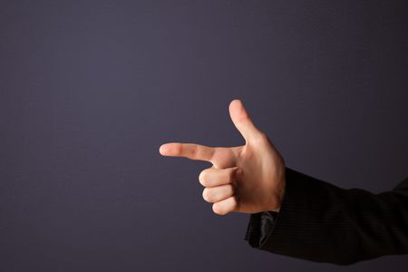 gun-shaped-man-hand-empty-space-158759231 Gun shaped man hand with empty space