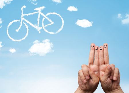 Happy cheerful smiley fingers looking at a bicycle shapeed cloud
