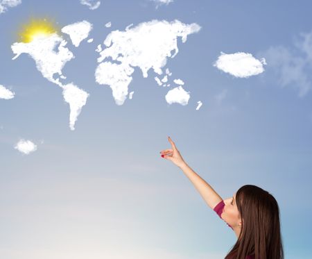 Young casual girl looking at world clouds and sun on blue sky