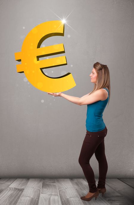 Beautiful young girl holding a big 3d gold euro sign