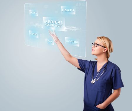 young-nurse-standing-pressing-modern-medical-160157636 Young nurse standing and pressing modern medical type of buttons