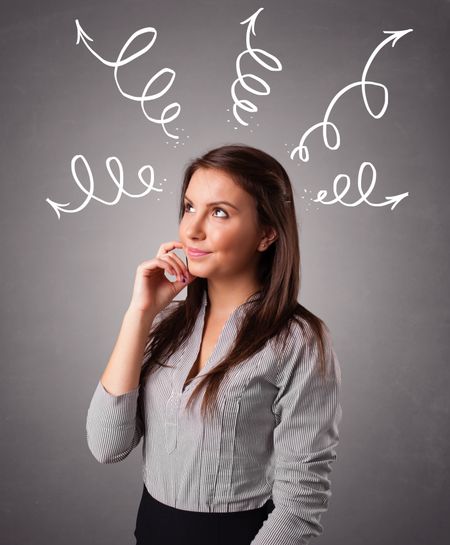 Beautiful young woman thinking with arrows overhead