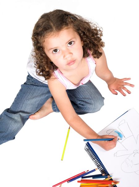beautiful kid colouring a drawing - outline of the book drawing was done by myself