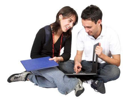 casual students on the floor over a white background