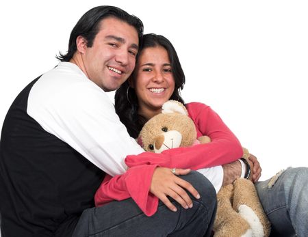 happy casual couple with a white background