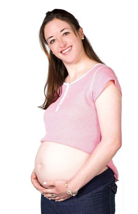happy pregnant woman over a white background