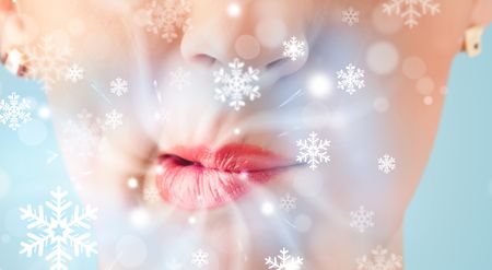 pretty-woman-mouth-blowing-cold-breeze-163175303 Pretty woman mouth blowing cold breeze close up