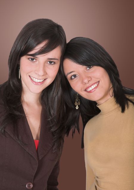casual girls over a brown background - clipping path to isolate them included with detail on hair