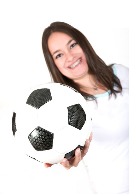 girl with braces holding a soccer ball