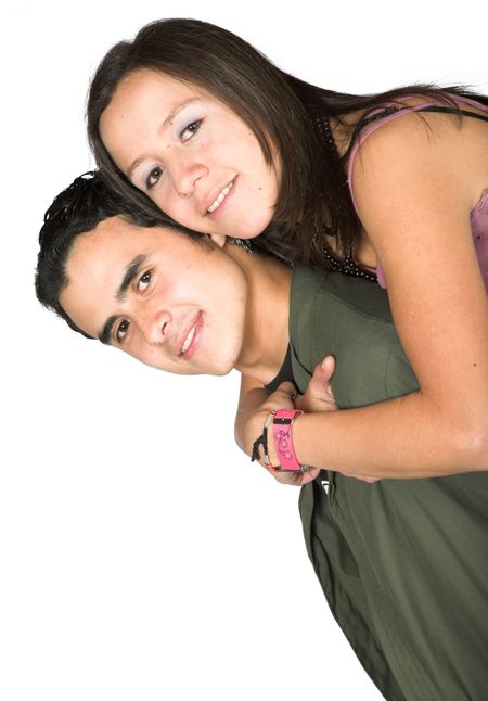 happy casual couple facing the camera over a white background