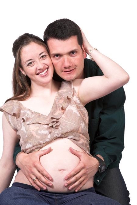 beautiful couple expecting a baby - white background