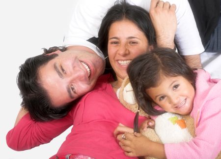 happy latin american family over a white background