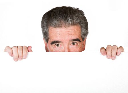 senior business man peeping over - white background