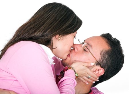casual couple kissing over white