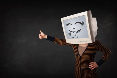 Young girl wearing a monitor with a funny face gesture