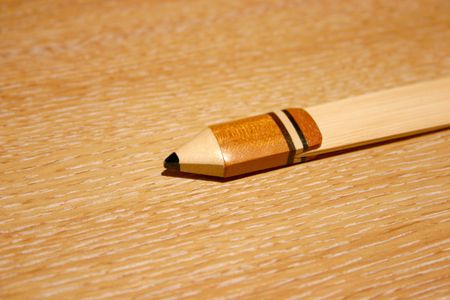 wooden pencil on a wooden desk