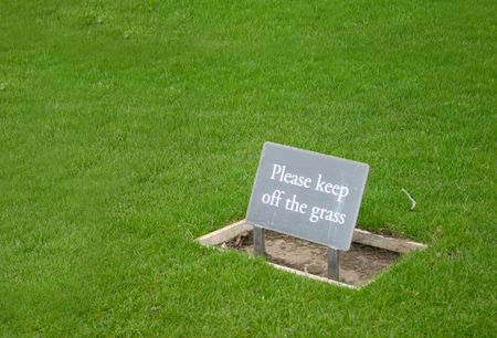 Keep off the grass sign