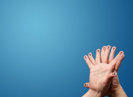 Happy smile face fingers cheerfully looking at empty blue background copy space