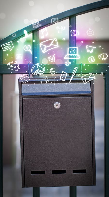Colorful modern icons and symbols bursting out of a mailbox