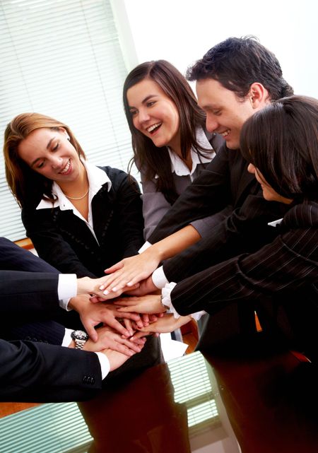 business office teamwork smiling and laughing together