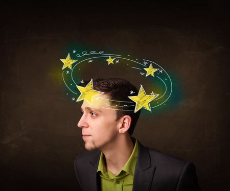 Young man with yellow stars circleing around his head illustration 