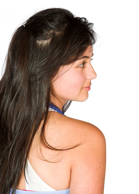 beautiful latin girl showing back over a white background