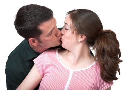 couple kissing over white
