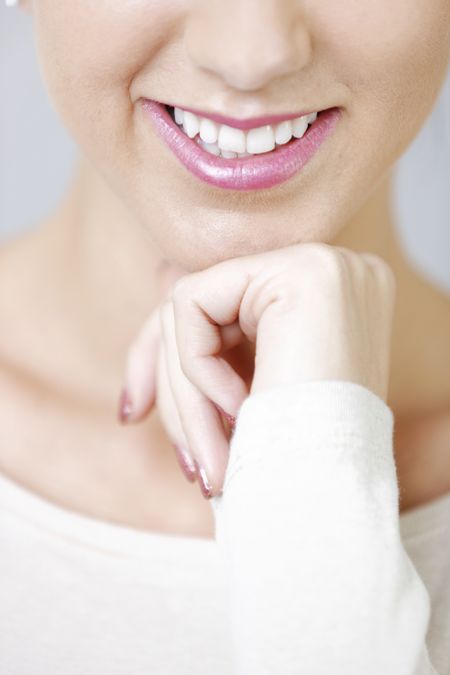 Attractive crop of a woman's face smiling