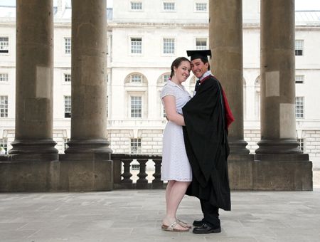 graduate and his partner at a university