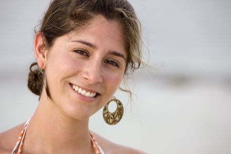 Beautiful beach girl portrait smiling