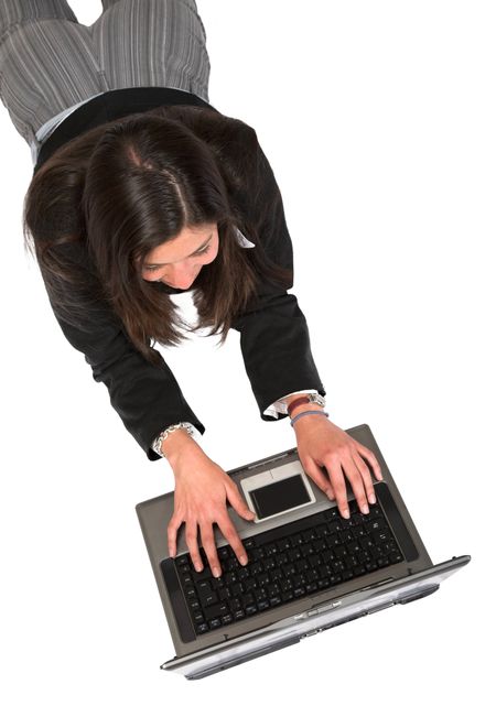 business woman working on laptop over white