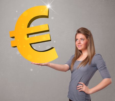 Beautiful young girl holding a big 3d gold euro sign