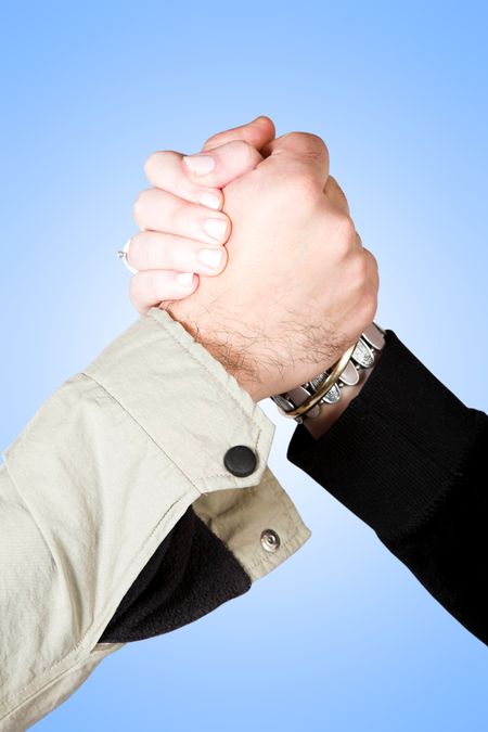 informal handshake over a blue background